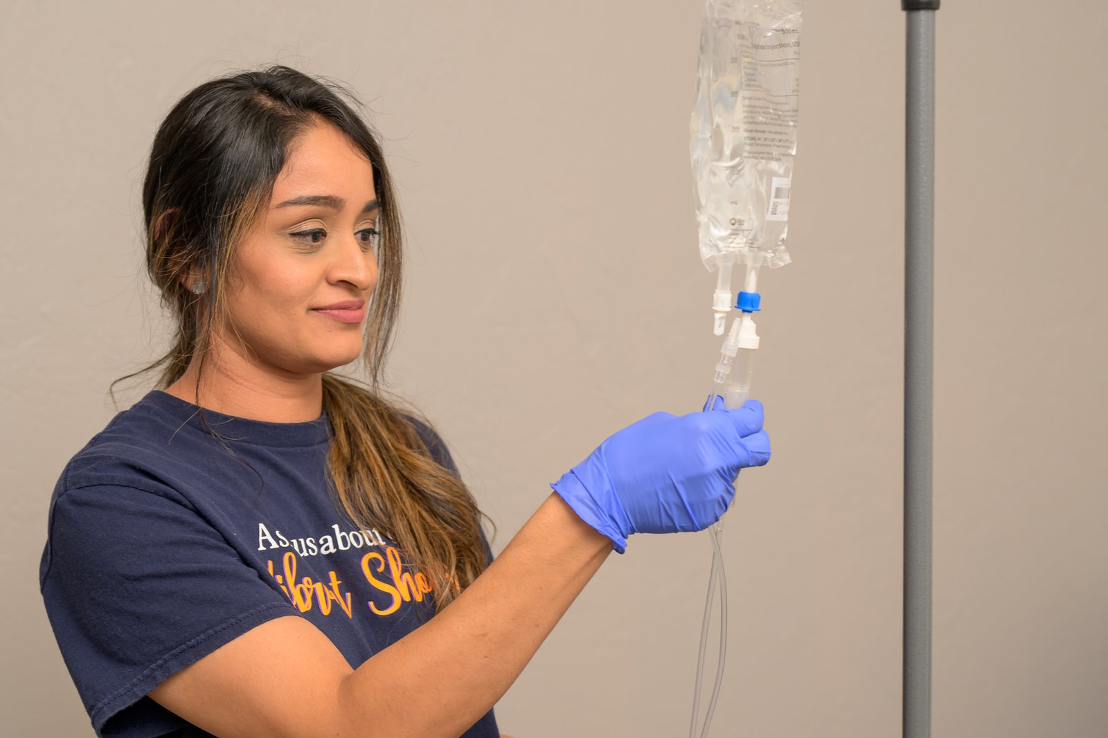 Nurse giving patient IV